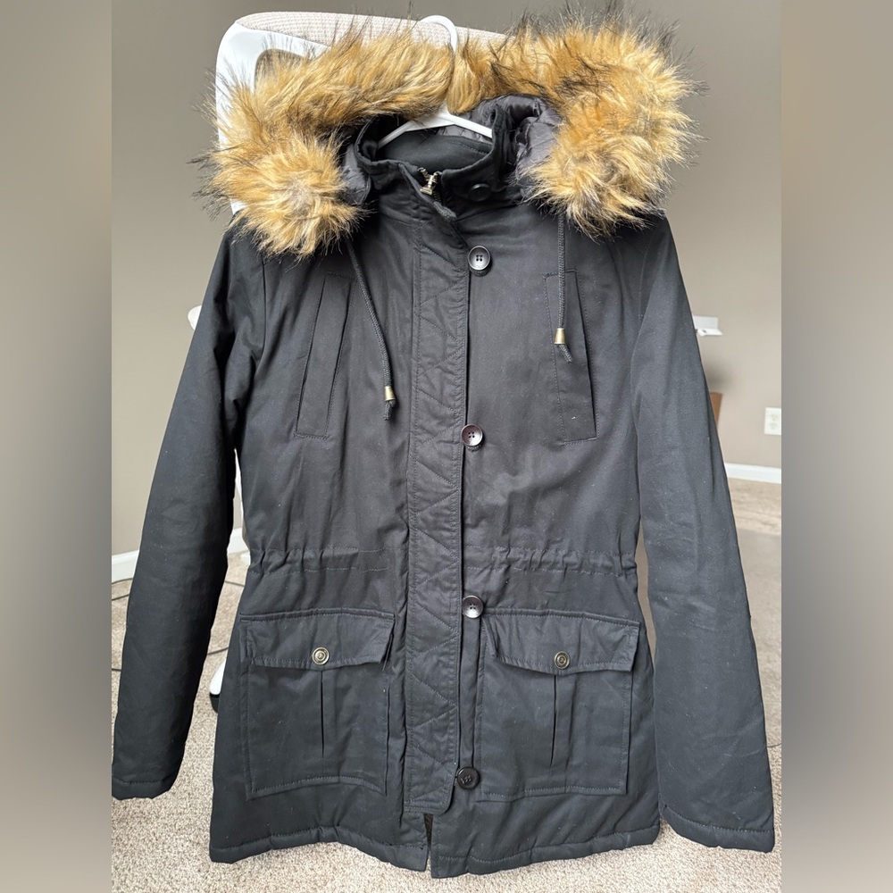 Women’s black winter jacket with fur